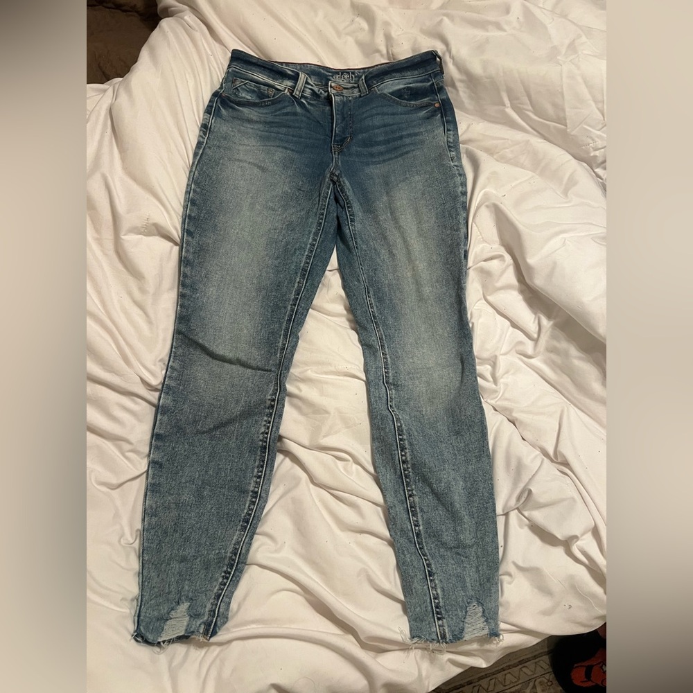 Maurice’s edgly skinny jeans. Light wash, distressed bottoms.